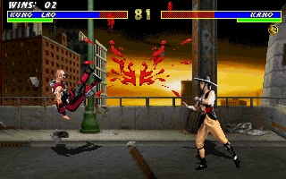 Mortal Kombat 3 (DOS) screenshot: Kano's blood spills everywhere after taking a hit from Kung Lao
