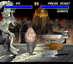 Mortal Kombat 3 (SNES) screenshot: After being involved by Kabal's "yarn" move, Sonya is unable to fight for some instants.