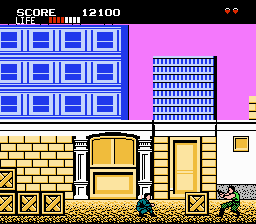 Shinobi (NES) screenshot: Shinobi can walk ducking to avoid enemy fire.