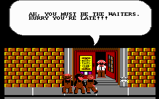 The Three Stooges (Commodore 64) screenshot: This guy thinks that the Stooges are really waiters. This could lead to trouble...