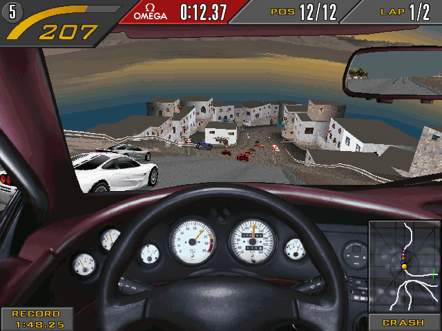 Need for Speed II (Windows) screenshot: Inside the Jaguar, speeding towards some mediterranean town.