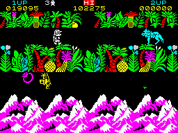 Sabre Wulf (ZX Spectrum) screenshot: The Mountains are the dwelling place of the <i>Wulf</i>. <br> - C'mon boy! Get over here you stupid!