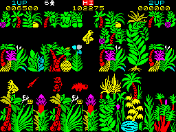Sabre Wulf (ZX Spectrum) screenshot: Sabreman was blessed by scarlet fever. He's red now and invulnerable. He's also like a ectoplasm and can get through every enemy.