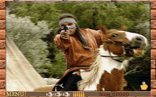 Mad Dog II: The Lost Gold (DOS) screenshot: Shoot the Indian before he shoots you.