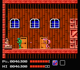 Teenage Mutant Ninja Turtles (NES) screenshot: End of Area 1, The fight with Rocksteady, Greenwich Village Warehouse