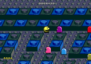 Pac-Mania (Genesis) screenshot: Pac is about to collide with the purple ghost