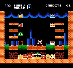 Parasol Stars: The Story of Bubble Bobble III (NES) screenshot: There are heaps of food you can collect to score more points