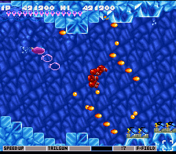 Parodius (SNES) screenshot: Twinbee swims underwater unleashing many boxing glove punches!