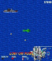 AH-6 Navy Battle (J2ME) screenshot: A "Low on fuel" message flashes, time to find a refill.