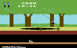 Pitfall! (Commodore 64) screenshot: Swinging over a bottomless pit