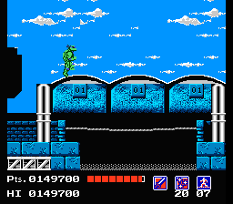 Teenage Mutant Ninja Turtles (NES) screenshot: Throwing a "Rope" over these buildings will get you through