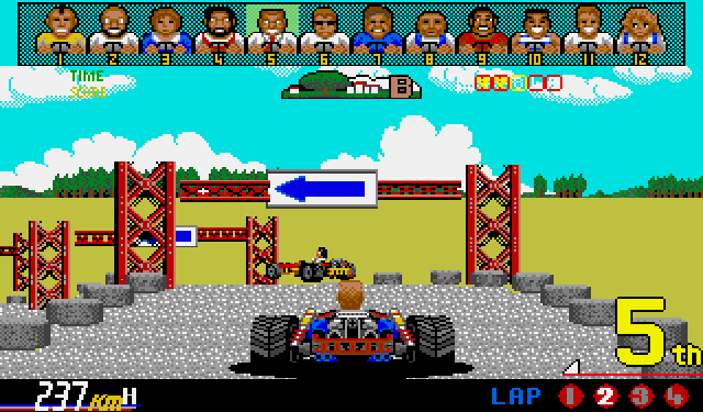 Power Drift (Amiga) screenshot: Sharp left turn ahead
