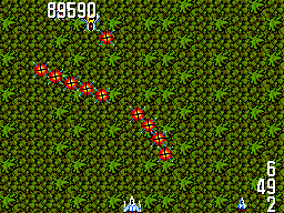 Power Strike (SEGA Master System) screenshot: Flying over dense forest