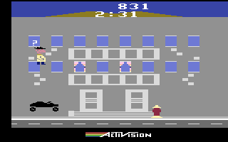 Private Eye (Atari 2600) screenshot: Jumping up to nab a questionable character