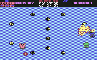 Psycho Pigs UXB (Commodore 64) screenshot: One bomb explodes, another is about to