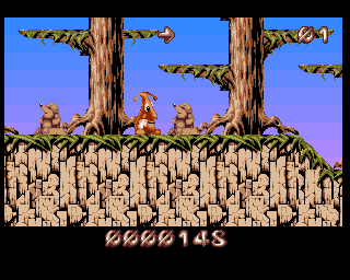 Puggsy (Amiga) screenshot: THE RED WOODS - Groundhogs can cause trouble in this forest level