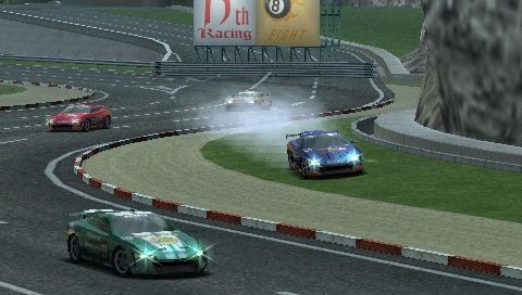 Ridge Racer (PSP) screenshot: Advanced driving part 2: Why stay on the track like the rest of the pack when you can take a shortcut?