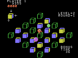 Q*bert's Qubes (ColecoVision) screenshot: Catching the green ball will temporarily freeze enemies