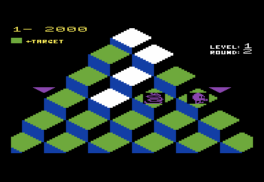 Q*bert (VIC-20) screenshot: Jump on the floating disc when the snake is chasing you