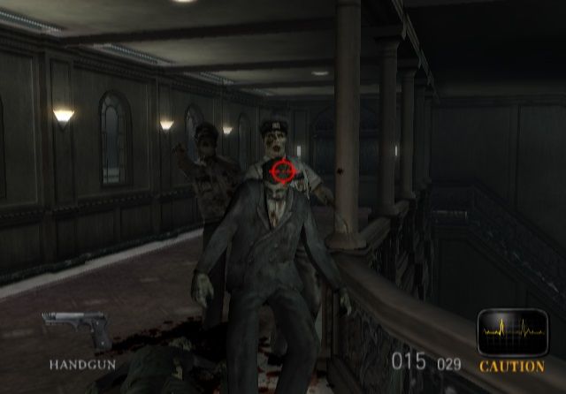 Resident Evil: Dead Aim (PlayStation 2) screenshot: Wasting ammo in some zombies