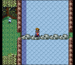 Terranigma (SNES) screenshot: Crossing a bridge of rhinoceroses! I think the designer confused them with hippos. A monkey is cheering