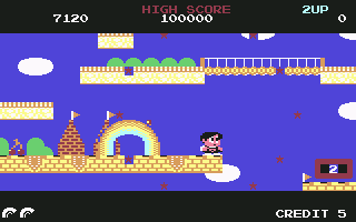 Rainbow Islands (Commodore 64) screenshot: A group of little red stairs circle off the screen