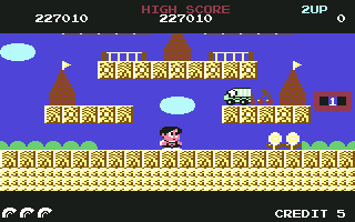 Rainbow Islands (Commodore 64) screenshot: "I used to have one of those little toy trucks when I was just a kid."