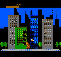 Rampage (NES) screenshot: Trashing Buildings....