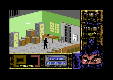 Ninja Remix (Commodore 64) screenshot: Level 4, "The Basement": Accessing the Office.<br> A special card is needed to activate the security elevator.