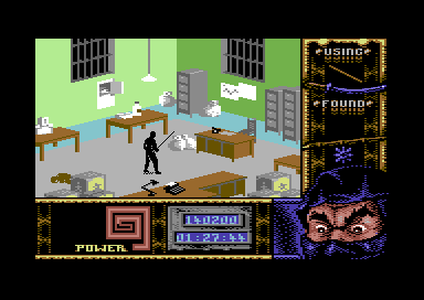 Ninja Remix (Commodore 64) screenshot: Level 4, "The Basement": An office.<br> There has to be some animal around here. A dish on the floor had a piece of chicken on it.