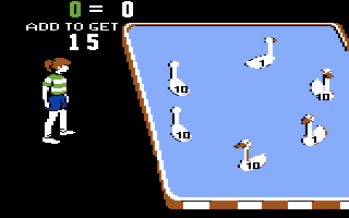 Sum Ducks (Commodore 64) screenshot: Toss rings on the ducks to add up to 15