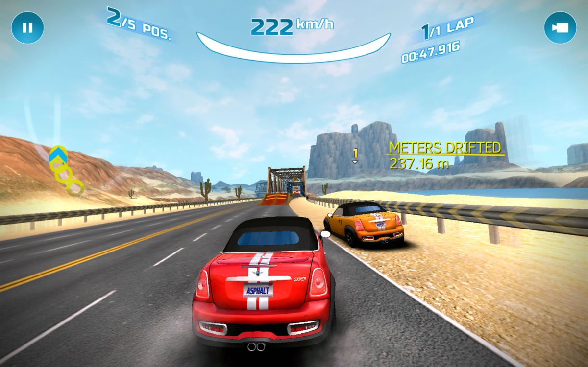 Asphalt: Nitro (Android) screenshot: Approaching a jump with my Mini Cooper S Roadster.