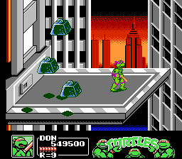 Teenage Mutant Ninja Turtles III: The Manhattan Project (NES) screenshot: Heavy objects thrown at an elevator attached to the side of a building