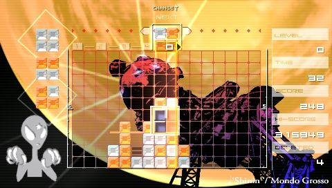 Lumines: Puzzle Fusion (PSP) screenshot: Yellow planet at «Shinin'» skin