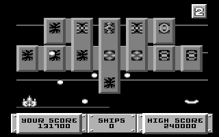 Bulldog (Commodore 64) screenshot: An end of level mothership; better dodge all of the bullets!
