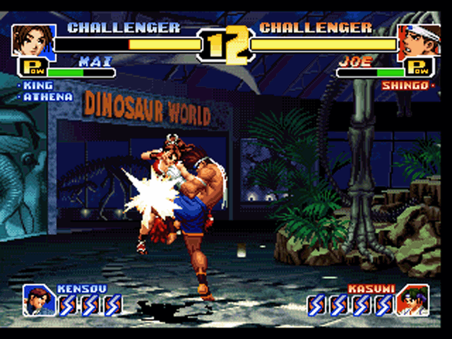 The King of Fighters '99: Millennium Battle (PlayStation) screenshot: Joe gives Mai a knee to the chest