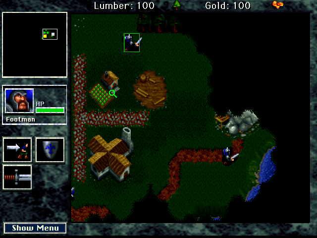 WarCraft: Orcs & Humans (Macintosh) screenshot: Footmen scout the immediate area at the start of the game.