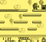 Tumble Pop (Game Boy) screenshot: Get the coin