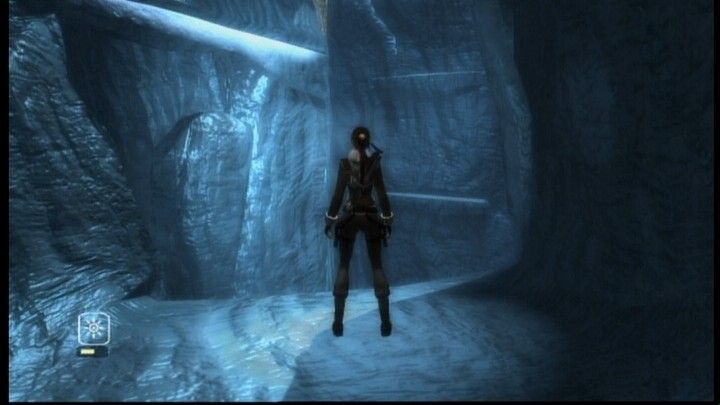 Lara Croft: Tomb Raider - Legend (Xbox 360) screenshot: It's slippery, freezing, dark, and overall unfriendly in these caves.