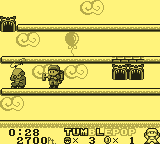 Tumble Pop (Game Boy) screenshot: Enemy gets dazed
