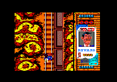Gun.Smoke (Amstrad CPC) screenshot: Literally 'on' the track too, but be careful of sticky movement across the rails