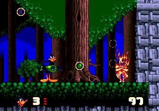Daffy Duck in Hollywood (Genesis) screenshot: Don't touch the burning ghost or you'll need some water.
