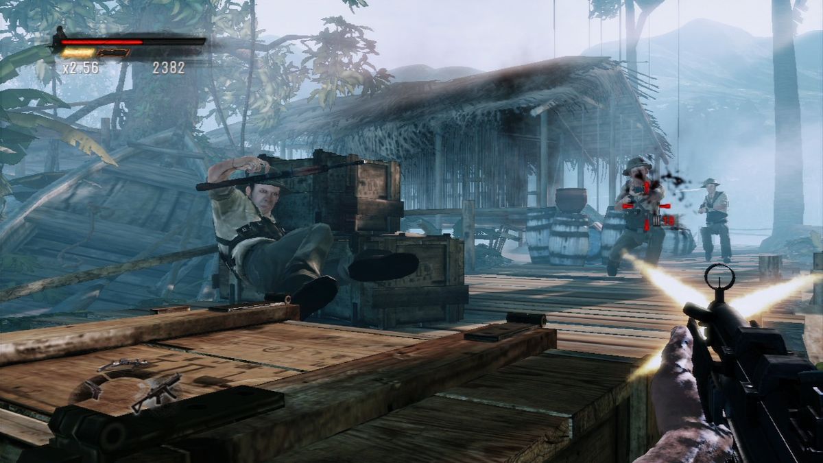 Rambo: The Video Game (PlayStation 3) screenshot: VC reinforcements are approaching the docks