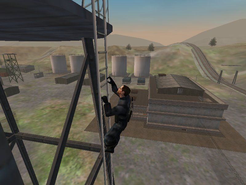 Project IGI: I'm Going In (Windows) screenshot: When doing certain actions like climbing or jumping, camera angle automatically changes, but you're free to use your camera movement as long as you're executing the action.