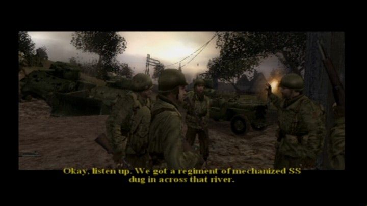 Call of Duty 2: Big Red One (PlayStation 2) screenshot: Time to join in with the rest and take out the enemy force dug in the town