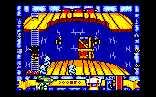 Mickey Mouse: The Computer Game (Amstrad CPC) screenshot: Climbing a ladder to get away