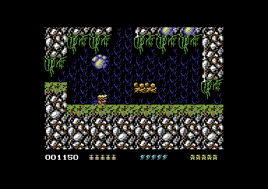 Rick Dangerous 2 (Commodore 64) screenshot: Rocks are dropping from the ceiling.