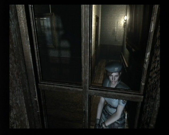 Resident Evil (GameCube) screenshot: Jill Scenario - As camera sets static, the view casted upon your character will vary, and let you experience something a little farther away as well.