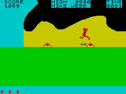 Jungle Fever (ZX Spectrum) screenshot: The caves 3 - 1 giant arrow, 2 giant spiders.