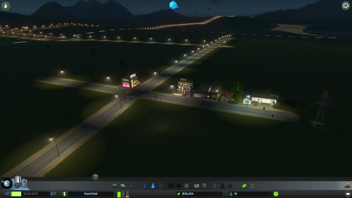 Cities: Skylines (Windows) screenshot: Night comes and a small town has been born.